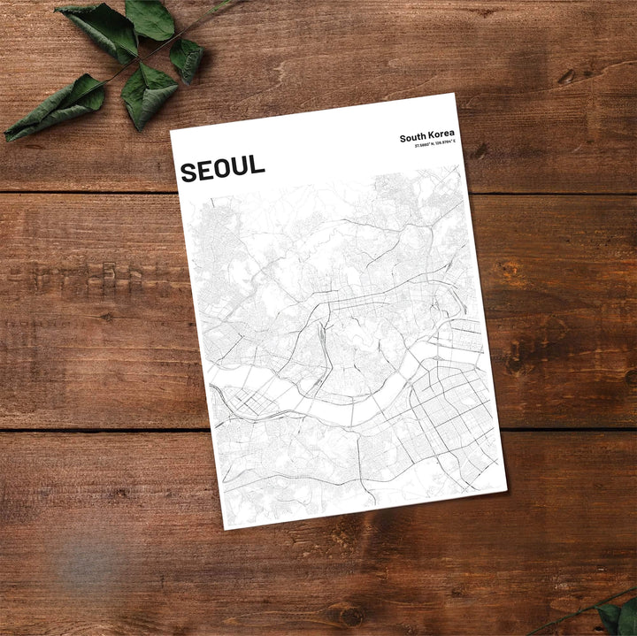 Panoramic style black and white seoul street map poster displaying coordinates and detailed city avenues, created by MapYourDreams with flexible formats including unframed prints, retro black frames, and stretched canvas that serve as sophisticated statement wall art.