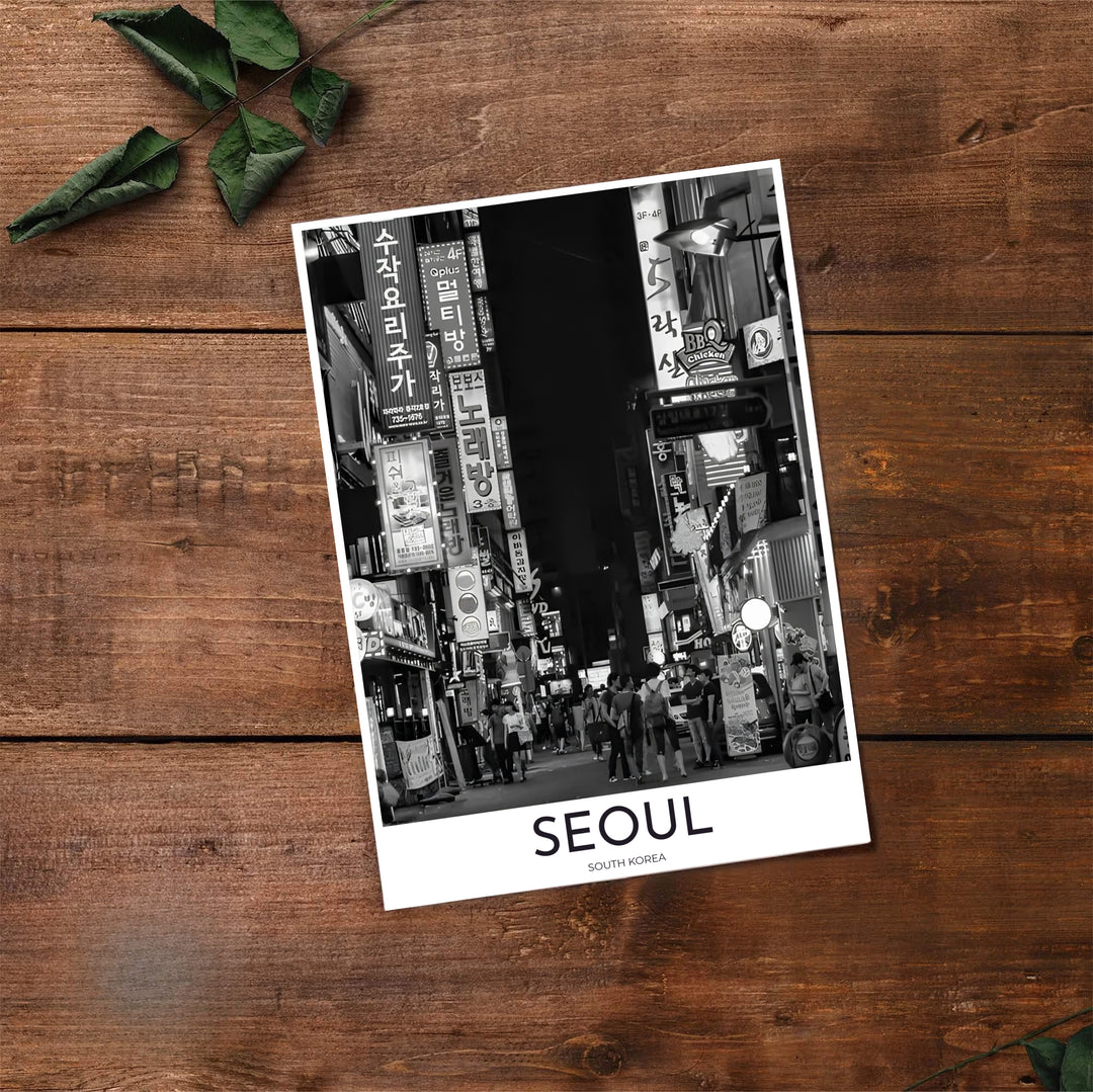 Panoramic style black and white night street poster showing a Korean alleyway filled with signs and activity in Seoul South Korea, created by MapYourDreams in flexible formats including unframed prints, retro black frames, and stretched canvas that serve as striking statement wall art.