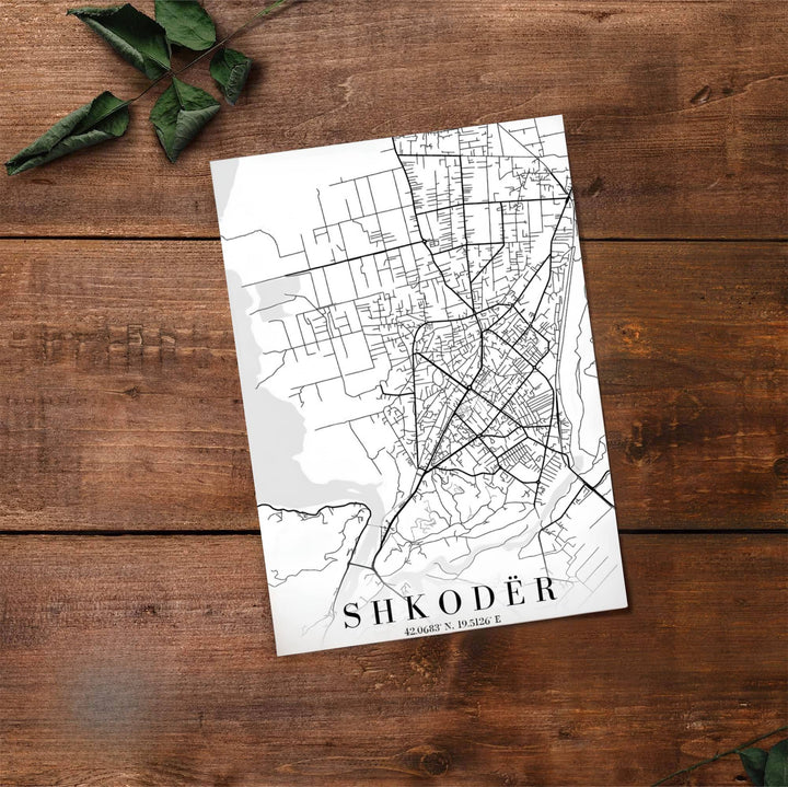 Fine line cartography traces the highways, streets, and lakes of Shkodër, Albania, on archival matte print substrate. Choose from flexible display setups including unframed archival paper, wooden frames, or wrapped canvas formats.