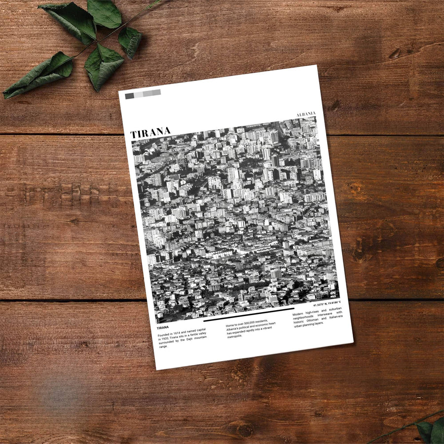 Fine art travel photograph showing Tirana with daylight lighting, high-density architecture, and clean city scenery across an inviting vertical view in stunning Black &amp; White. Choose from flexible display setups including unframed archival paper, wooden frames, or wrapped canvas formats.