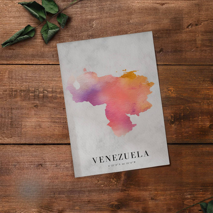 Scenic map poster displaying the country silhouette of Venezuela in a warm sunset watercolor color palette. Handpicked for the MapYourDreams catalog, this artwork is available in flexible styles including unframed paper prints, wooden frames, or gallery canvas.