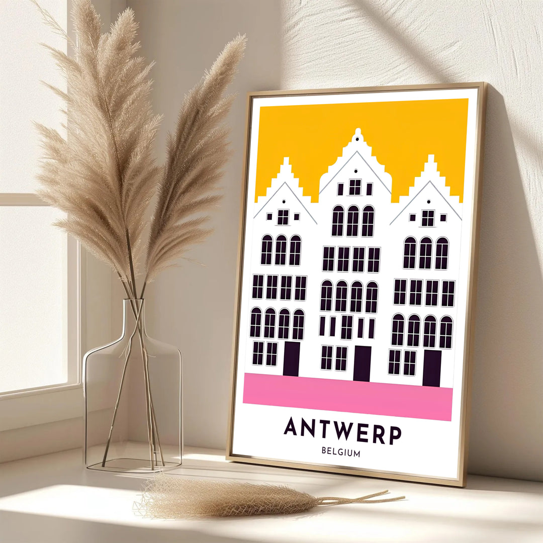 A refined architectural print showcasing the stepped rooftop skyline of Antwerp, Belgium, in vibrant yellow, pink, and deep indigo. Offered in flexible choices such as unframed archival poster paper, custom wood framing, and gallery canvas wraps.