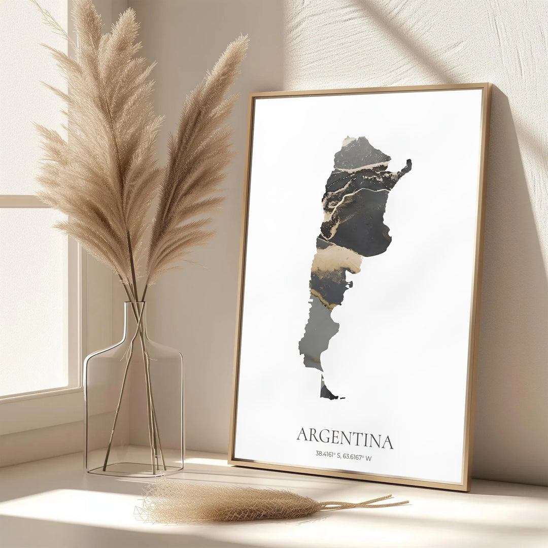 Argentina country outline artwork in a black and gold color palette mounted on white backing for modern wall styling. An exclusive from MapYourDreams, you can select your preferred style from borderless paper prints, custom wooden framing, or gallery canvas wraps.