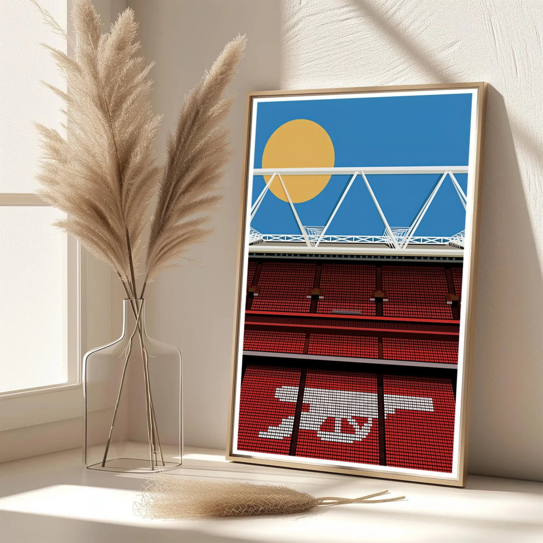 Modern graphic stadium print showcasing Emirates Stadium with red seats, white steel roof girders, and golden sun geometry. Decorate your office with choices ranging from simple unframed poster paper to sturdy custom wood frames and stretched canvas wall displays.