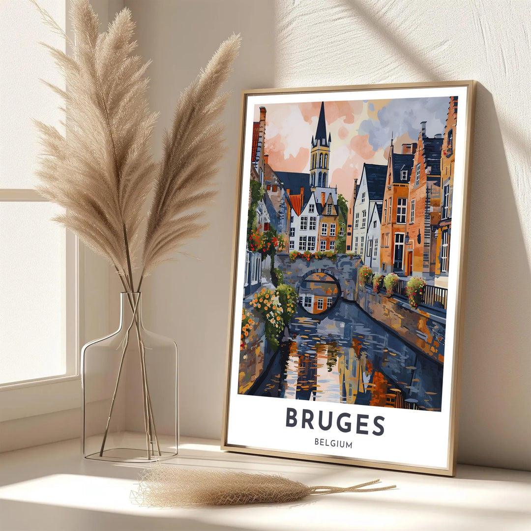 A refined European art print showcasing the fairytale canal scenery of Bruges, Belgium, in warm terracotta, ochre, and slate hues. Offered in flexible choices such as unframed archival poster paper, custom wood framing, and gallery canvas wraps.