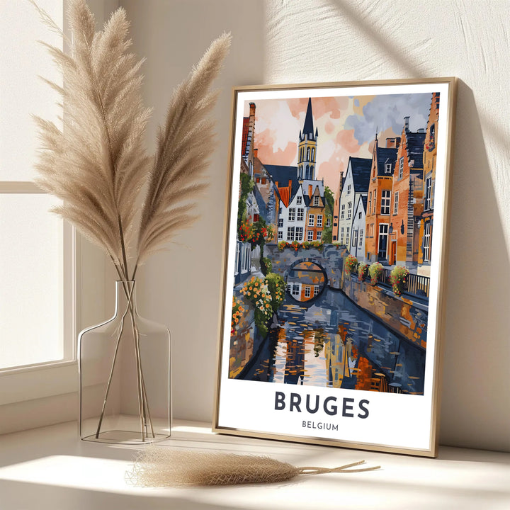 A refined European art print showcasing the fairytale canal scenery of Bruges, Belgium, in warm terracotta, ochre, and slate hues. Offered in flexible choices such as unframed archival poster paper, custom wood framing, and gallery canvas wraps.