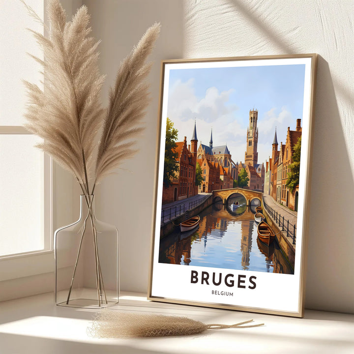A refined European art print showcasing the iconic skyline and canal scenery of Bruges, Belgium, in warm terracotta, slate, and cerulean blue. Offered in flexible choices such as unframed archival poster paper, custom wood framing, and gallery canvas wraps.