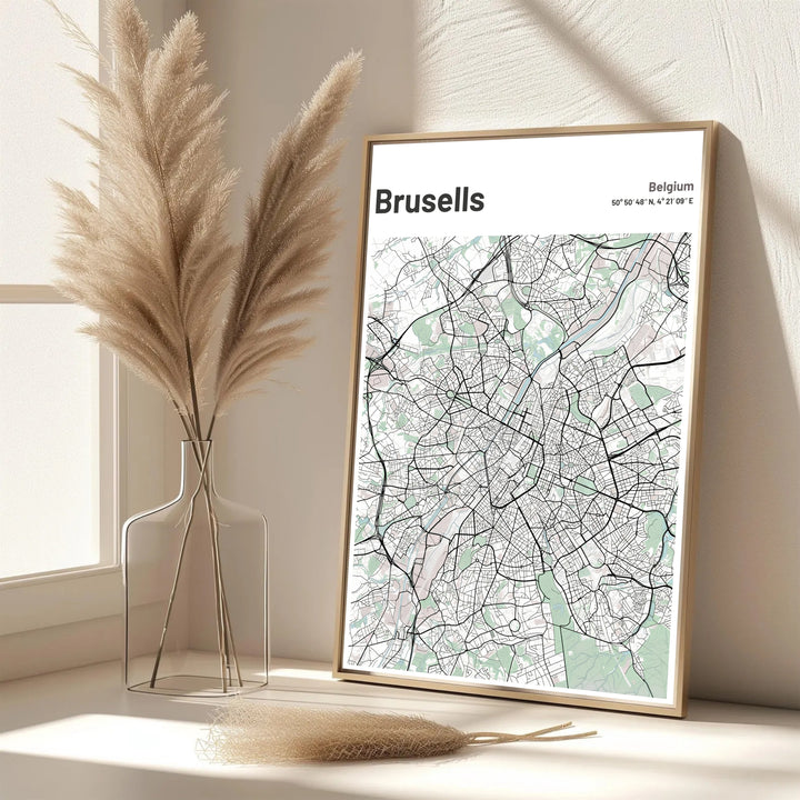 A picturesque Belgian city map print featuring the roadways and green parks of Brussels, Belgium, in a light green aesthetic. Offered in flexible choices such as unframed archival poster paper, custom wood framing, and gallery canvas wraps.