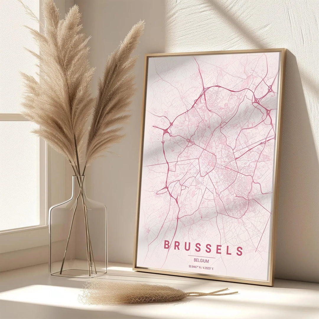 A picturesque Belgian city map print featuring the roadways and urban network of Brussels, Belgium, in a pink minimalist aesthetic. Offered in flexible choices such as unframed archival poster paper, custom wood framing, and gallery canvas wraps.