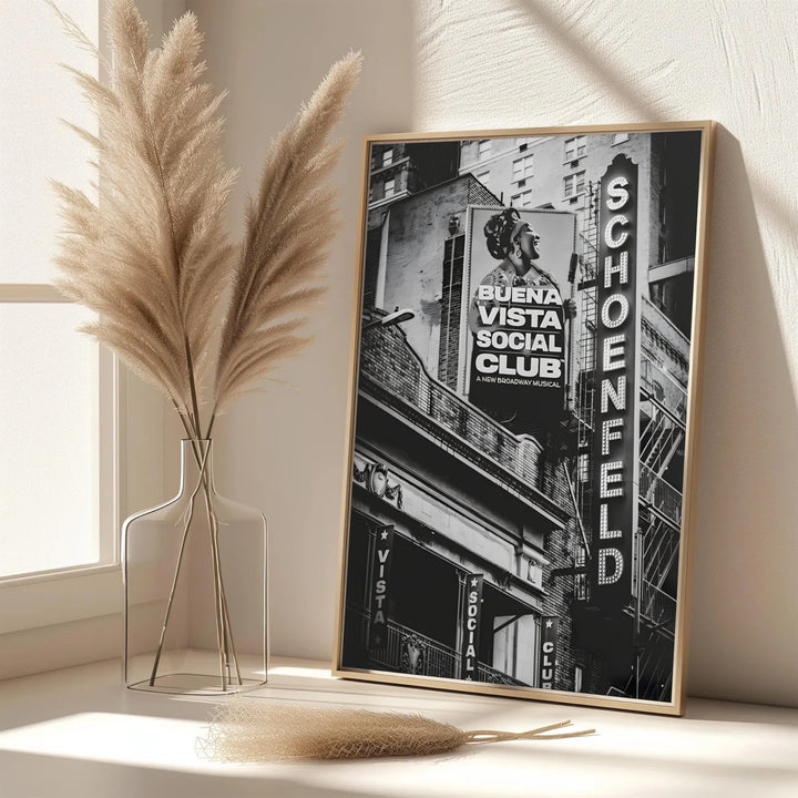 Elegant black and white venue art print featuring glowing marquee letters, detailed brickwork, and show posters at the Gerald Schoenfeld Theatre, provided by MapYourDreams with options for an unframed paper print, a gallery wrapped canvas, or a custom framed presentation style for theatre lovers.