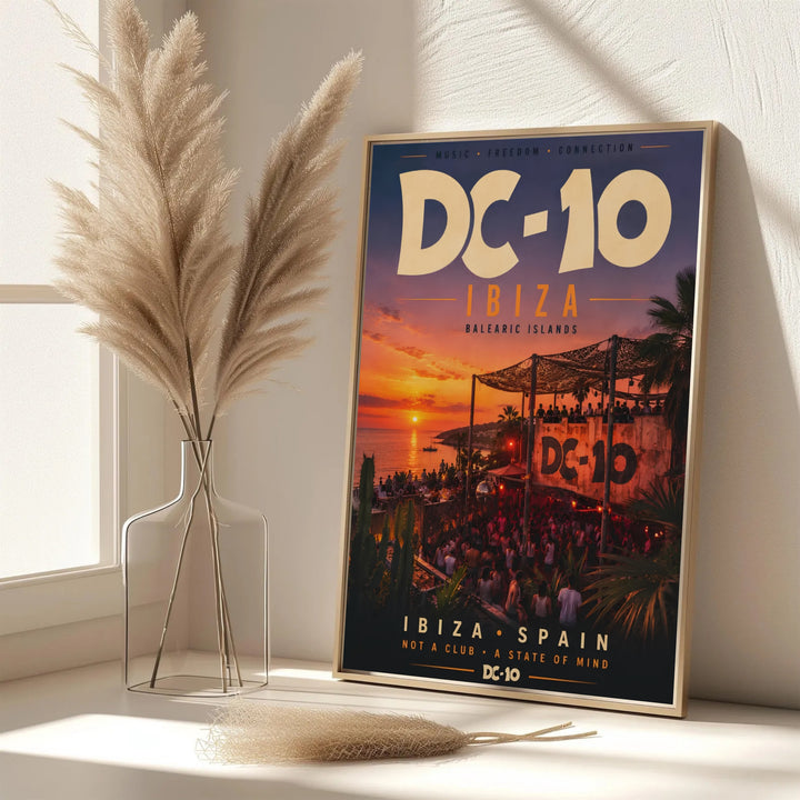 Vibrant sunset horizon art poster with bold typography illustrating DC-10 in Ibiza, Spain, offered at MapYourDreams with options for unframed paper prints, gallery-quality stretched canvas, or custom frame finishes for colorful interior arrangements.