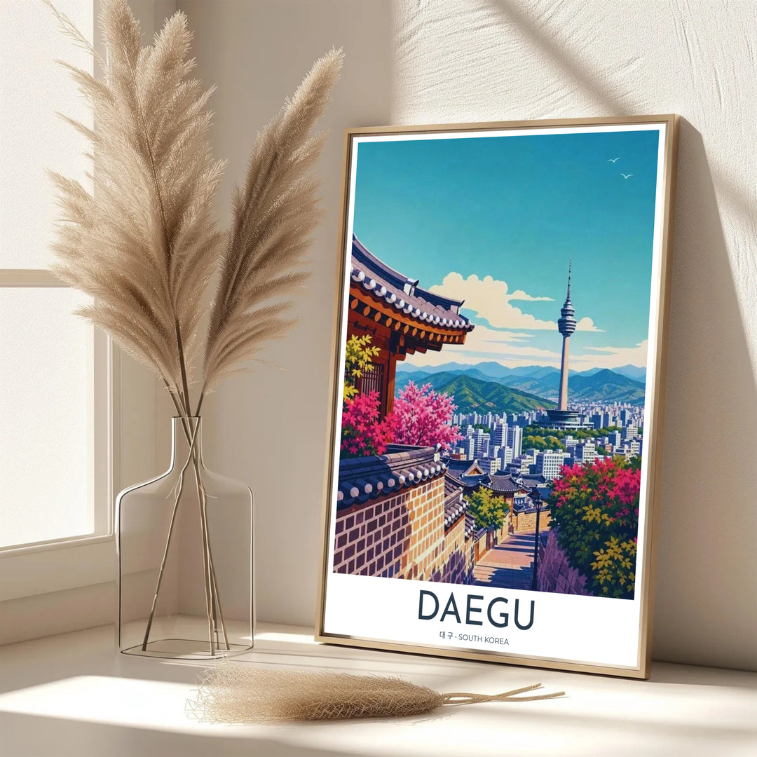 Vibrant South Korean urban decor print of Daegu showcasing an alleyway perspective framing the city skyline, mountain ridges, and iconic radio observation tower. Offered by MapYourDreams, this artwork is available in flexible options including unframed paper, custom wooden frames, and gallery canvas wraps.