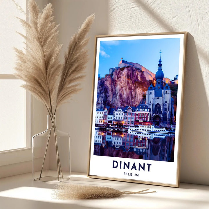 A picturesque Belgian city photo showing the dramatic cliff, church dome, and river view in Dinant, Belgium. Offered in flexible choices such as unframed archival poster paper, custom wood framing, and gallery canvas wraps.