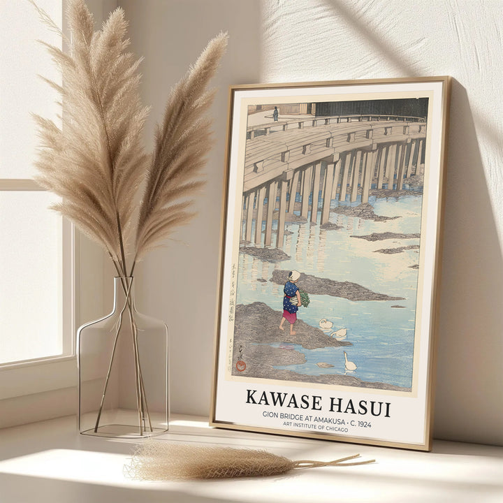 Dynamic Japanese bridge poster Gion Bridge at Amakusa by artist Kawase Hasui featuring stone pillars and tidal stream at Gion Bridge in Amakusa. MapYourDreams features framed, unframed, and canvas print options for office wall art decor.