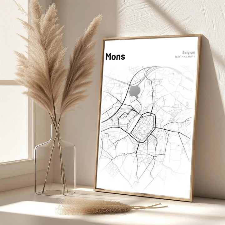 Elegant minimalist map wall poster of Mons, Belgium, offering a subtle connection to favorite travel memories and European trips. Offered by MapYourDreams, this artwork is available in flexible options including unframed paper, custom wooden frames, and gallery canvas wraps.