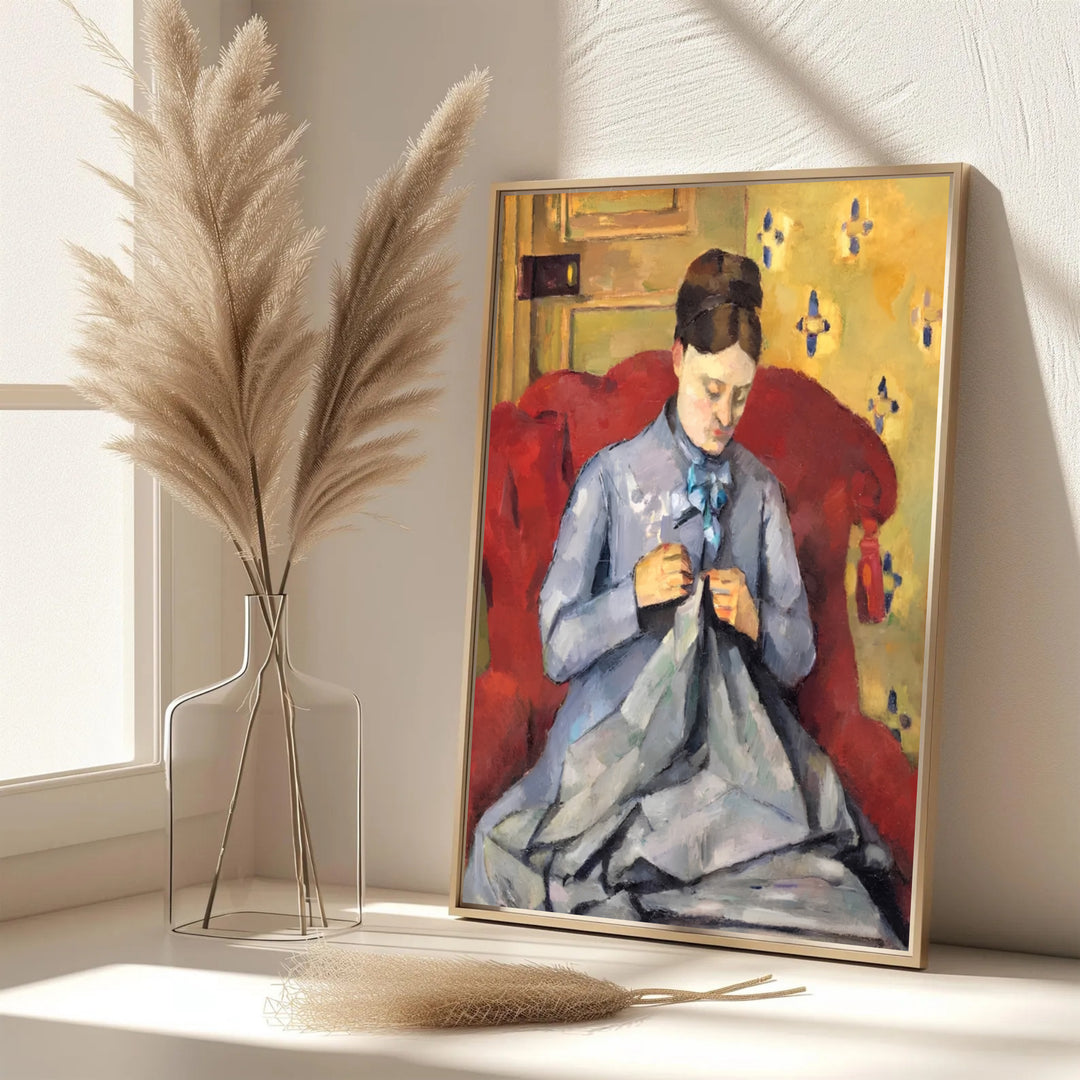 Elegant living room wall art print of Paul Cezanne Madame Cezanne Sewing 1877 displaying detailed fabric folds in Paris France. MapYourDreams features custom framed prints, unframed paper wall decor, and gallery canvas options for refined home wall layouts.
