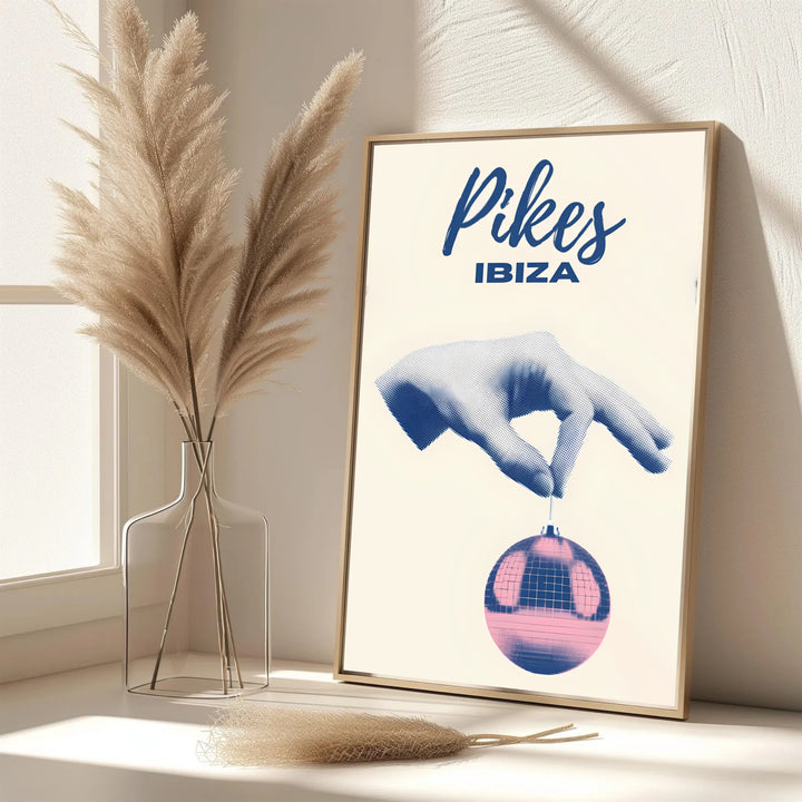 Nostalgic Balearic music art print displaying Pikes Ibiza script header over a surreal halftone hand and disco ball, created by MapYourDreams with choices including unframed poster prints, gallery stretched canvas, or custom framed wall art.