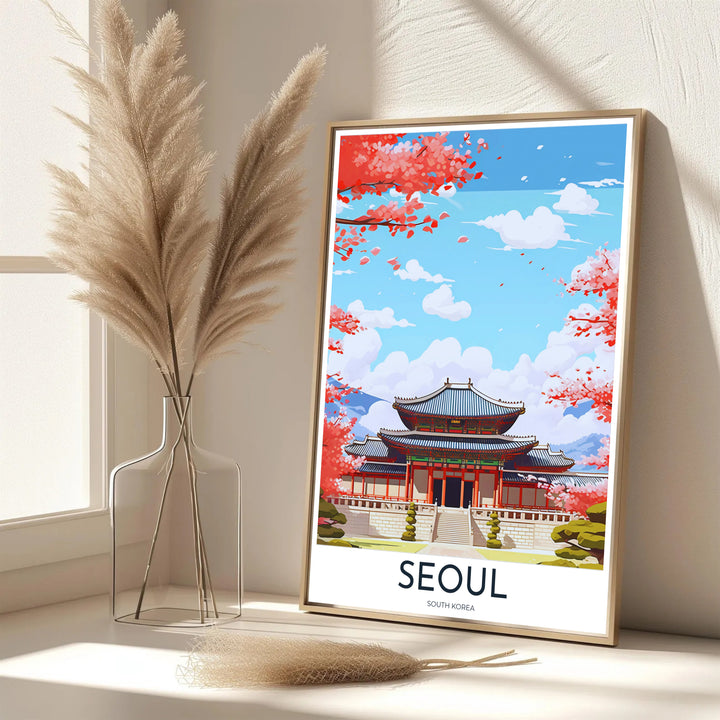 Vibrant South Korean cultural decor print showcasing Gyeongbokgung Palace in Seoul under a brilliant blue sky with soft drifting clouds and falling cherry blossom petals. Offered by MapYourDreams, this artwork is available in flexible options including unframed paper, custom wooden frames, and gallery canvas wraps.