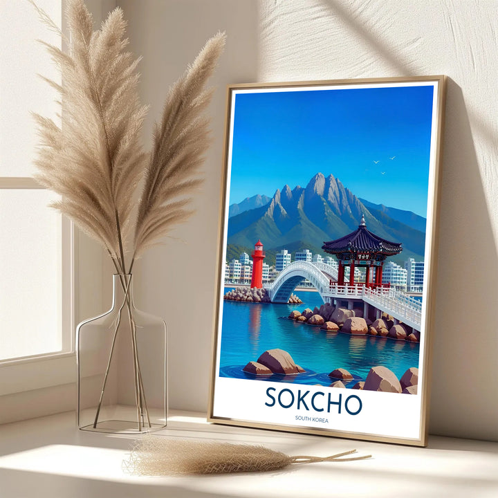 Sophisticated Asian travel poster showcasing seaside rocks, clear ocean waters, and pavilion architecture in Sokcho South Korea, brought to you by MapYourDreams in options like unframed archival paper, solid frames, and canvas wraps crafted with archival fade-resistant inks.