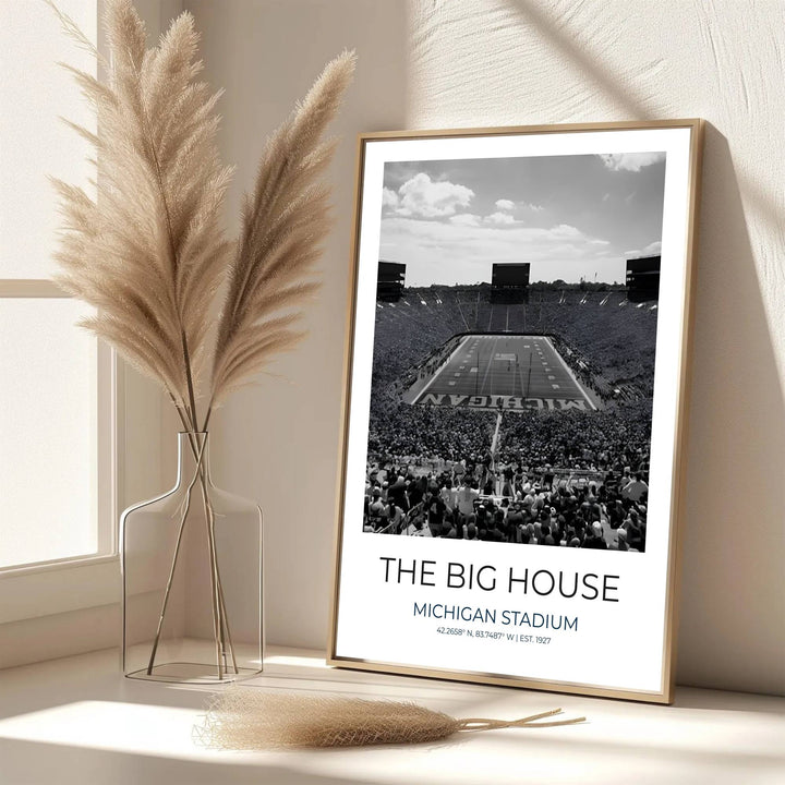 Timeless monochrome sports wall art print of The Big House in Ann Arbor featuring sweeping end zone views and cloud dappled sky. Designed by MapYourDreams, this artwork is available in flexible options including unframed paper, custom wooden frames, and gallery canvas wraps for home wall art.