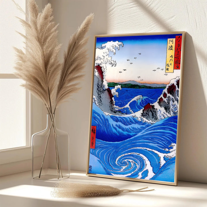 Elegant Japanese sea wave poster Naruto Whirlpool Awa Province by artist Utagawa Hiroshige featuring crashing white foam waves in Naruto Whirlpool Awa Province. MapYourDreams features framed, unframed, and canvas print options for office wall art decor.
