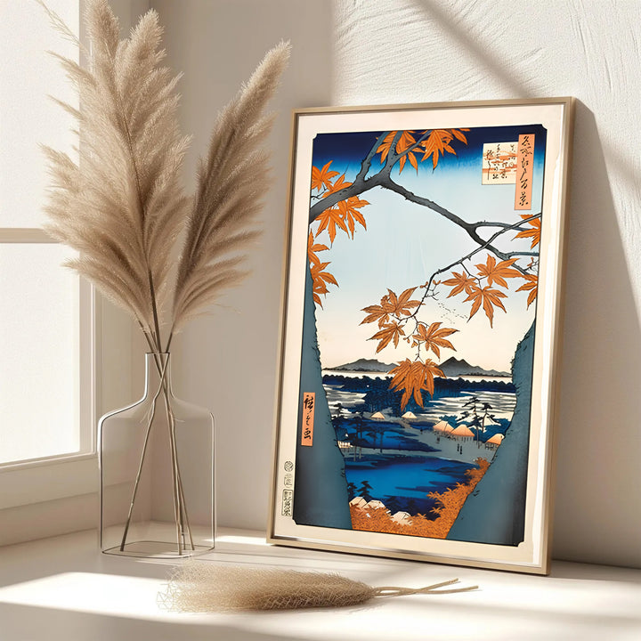 Elegant Japanese autumn poster Maple Trees at Mama by artist Utagawa Hiroshige featuring maple branches over river at Maple Trees at Mama and Tekona Shrine. MapYourDreams features framed, unframed, and canvas print options for living room wall art decor.