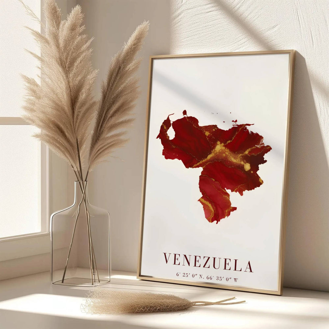 Scenic map poster displaying the country silhouette of Venezuela in a passionate fluid ink and metallic gold color palette. Handpicked for the MapYourDreams catalog, this artwork is available in flexible styles including unframed paper prints, wooden frames, or gallery canvas.