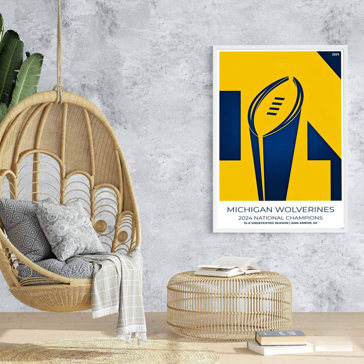 Wall art poster of Michigan Football featuring 2024 National Champions trophy graphics in vibrant yellow and dark navy blue. Prepared by MapYourDreams, this artwork is available in flexible options including unframed paper, custom wooden frames, and gallery canvas wraps for chic home decor.