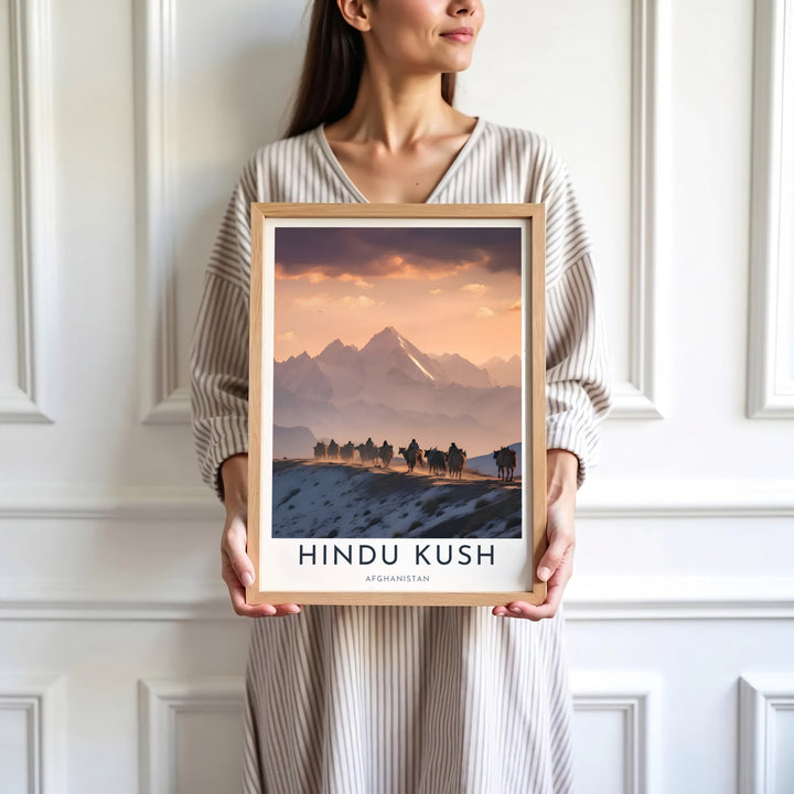Dramatic alpine landscape poster of the Hindu Kush mountains in Afghanistan rendered in vibrant sunset colors with clean typography, presented by MapYourDreams as an unframed paper print, gallery canvas, or custom framed decor in black, natural wood, and white frames for studio wall arrangements.