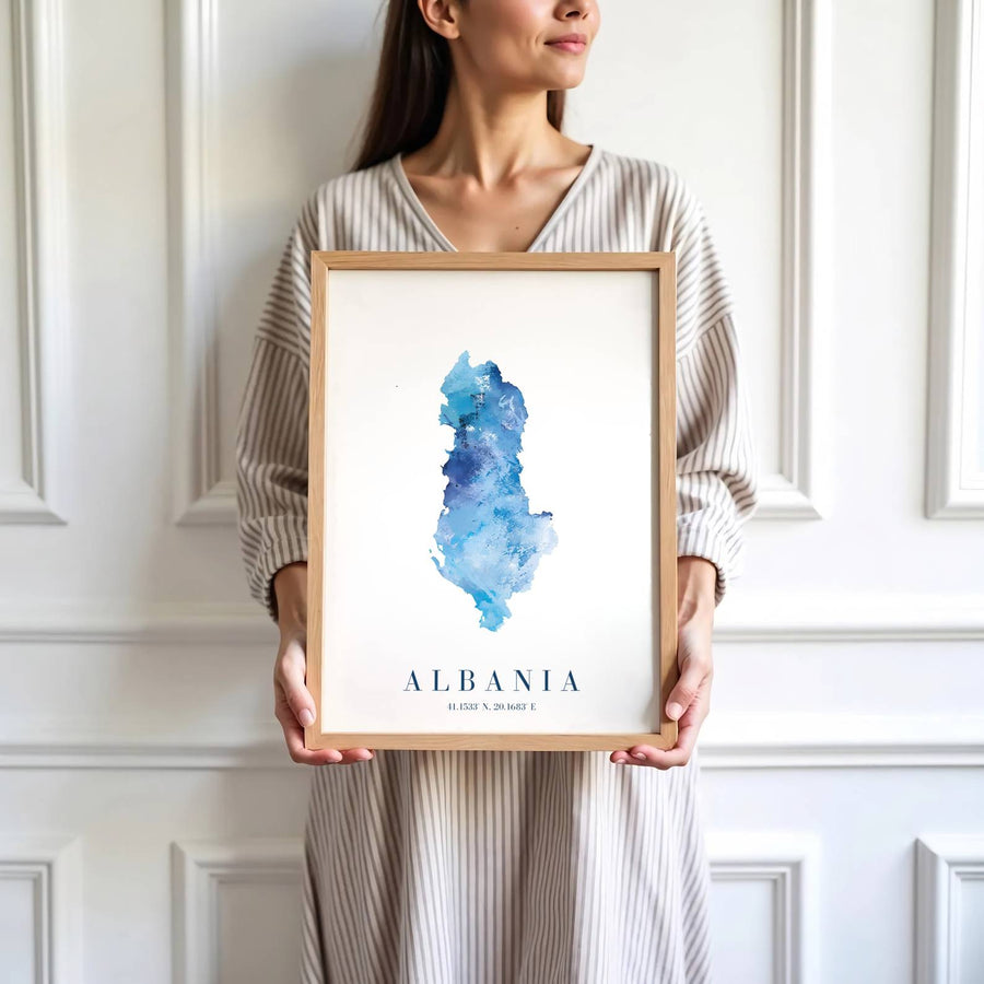 Eye-catching blue watercolor map print of Albania created with archival matte materials to preserve rich ocean colors over time without fading indoors. Offered by MapYourDreams, this artwork is available in flexible options including unframed paper, custom wooden frames, and gallery canvas wraps for room decor.