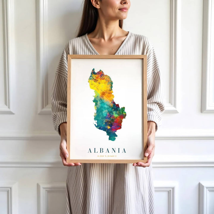 Crisp cartographic artwork showing the country map of Albania in vivid watercolor hues with modern serif country lettering and coordinate details. Offered by MapYourDreams, this artwork is available in flexible options including unframed paper, custom wooden frames, and gallery canvas wraps.