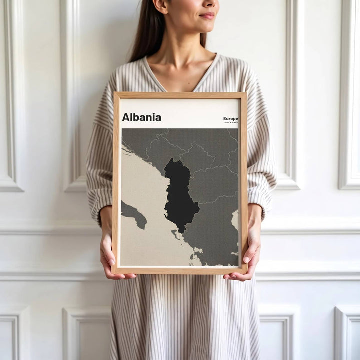 Crisp cartographic artwork showing the regional map of Albania in solid black and cross-hatched grey with modern sans-serif country lettering. Offered by MapYourDreams, this artwork is available in flexible options including unframed paper, custom wooden frames, and gallery canvas wraps.