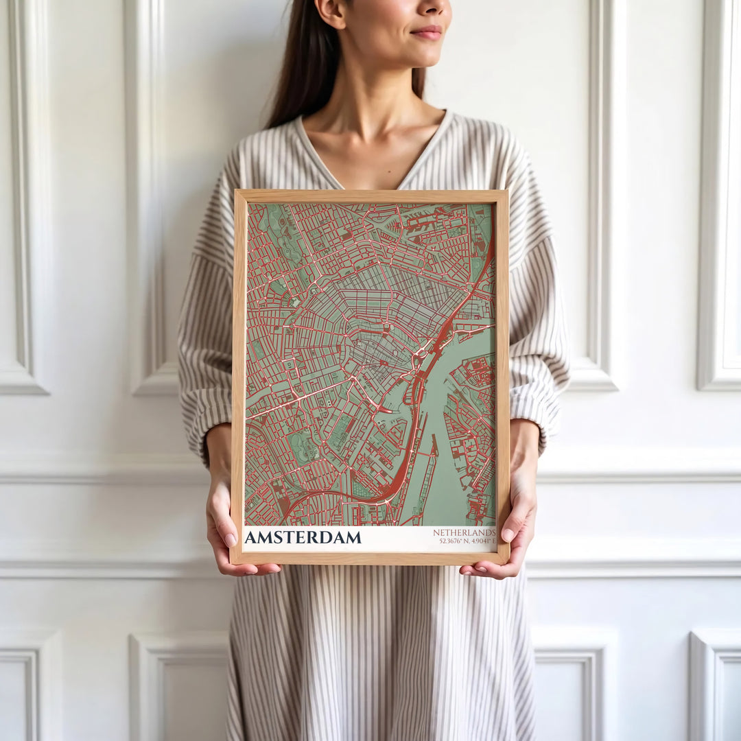 Sophisticated European cartography print of an Amsterdam street map with terracotta red lines on a sage green background, presented by MapYourDreams where customers can choose from unframed paper posters, ready-to-hang canvas, or custom framed wall decor options.