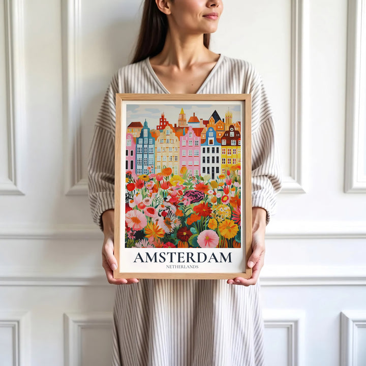 Sophisticated European illustration print of Amsterdam canal houses behind a lush meadow of spring flowers, presented by MapYourDreams where customers can choose from unframed paper posters, ready-to-hang canvas, or custom framed wall decor options.