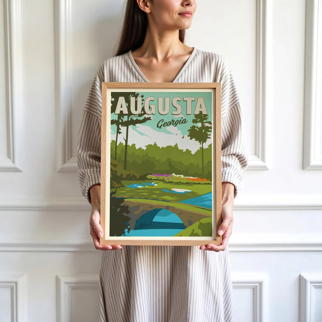 Minimalist golf course wall art print depicting the stone arch bridge, white sand hazards, and pine trees of Augusta Georgia in graphic style. Offered by MapYourDreams, this artwork is available in flexible options including unframed paper, custom wooden frames, and gallery canvas wraps for tailored home wall decor setups.