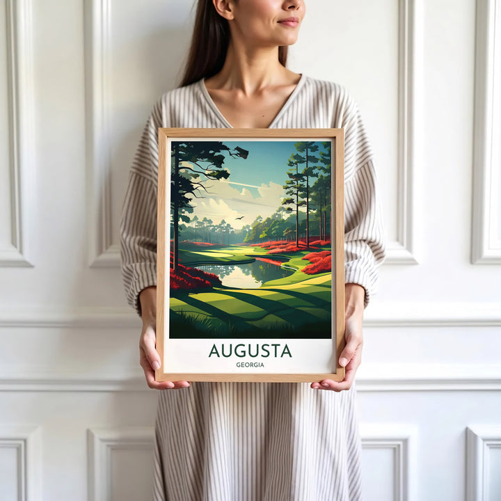 Minimalist graphic golf course wall art print depicting the serene water bend, crimson azaleas, and sweeping fairway of Augusta Georgia. Offered by MapYourDreams, this artwork is available in flexible options including unframed paper, custom wooden frames, and gallery canvas wraps for tailored home wall decor setups.