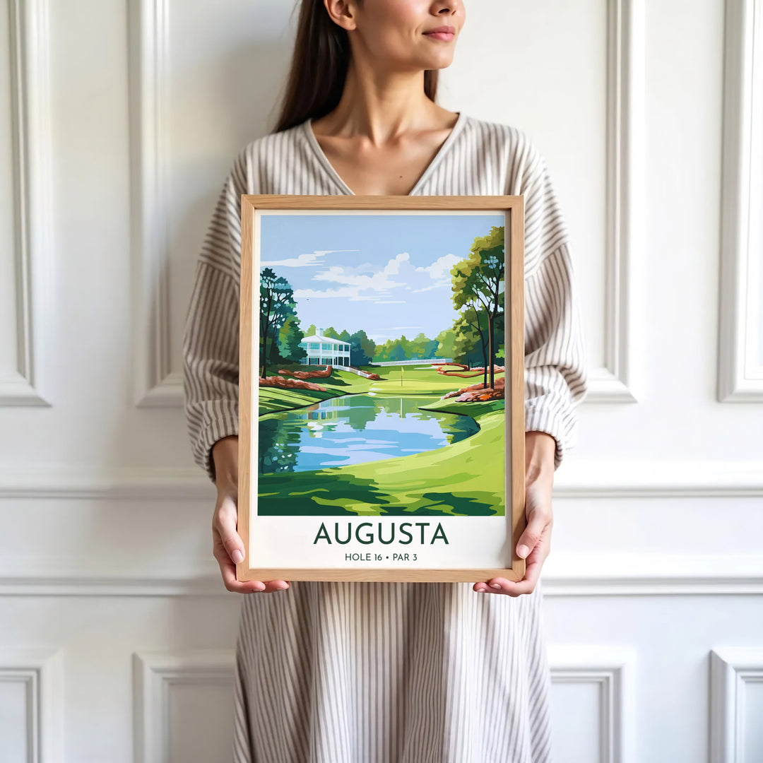 Minimalist graphic golf course wall art print depicting the serene pond edge, slope of the green, and background trees of Augusta Georgia. Offered by MapYourDreams, this artwork is available in flexible options including unframed paper, custom wooden frames, and gallery canvas wraps for tailored home wall decor setups.
