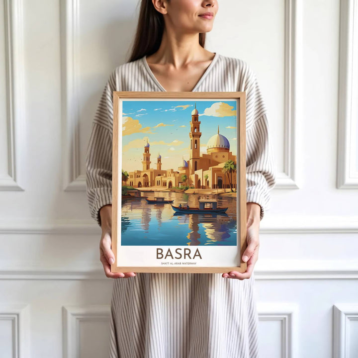 High detail vintage print depicting Basra Iraq riverfront with traditional boats and blue domed mosque architecture. Brought by MapYourDreams, this artwork is available in flexible options including unframed paper, custom wooden frames, and gallery canvas wraps for study room decor.