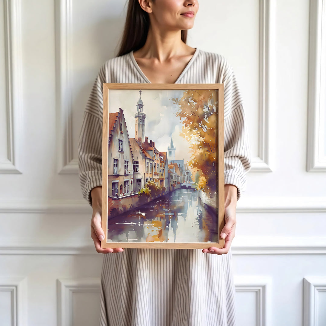 Sophisticated watercolor artwork focusing on Bruges, Belgium, capturing autumn foliage, soft water reflections, and soaring medieval spires. Available in multiple presentation styles such as unframed paper prints, custom framed posters, and gallery stretched canvas.