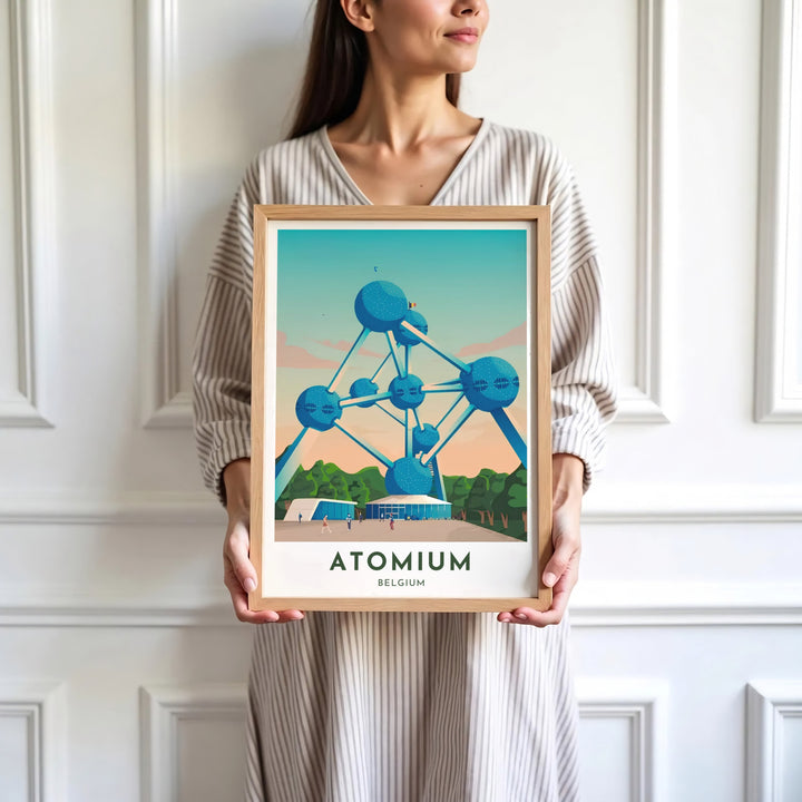 Dynamic landmark wall art highlighting the iconic steel spheres and tubular struts of the Atomium in Brussels, Belgium, in striking teal tones. Available in multiple presentation styles such as unframed paper prints, custom framed posters, and gallery stretched canvas.