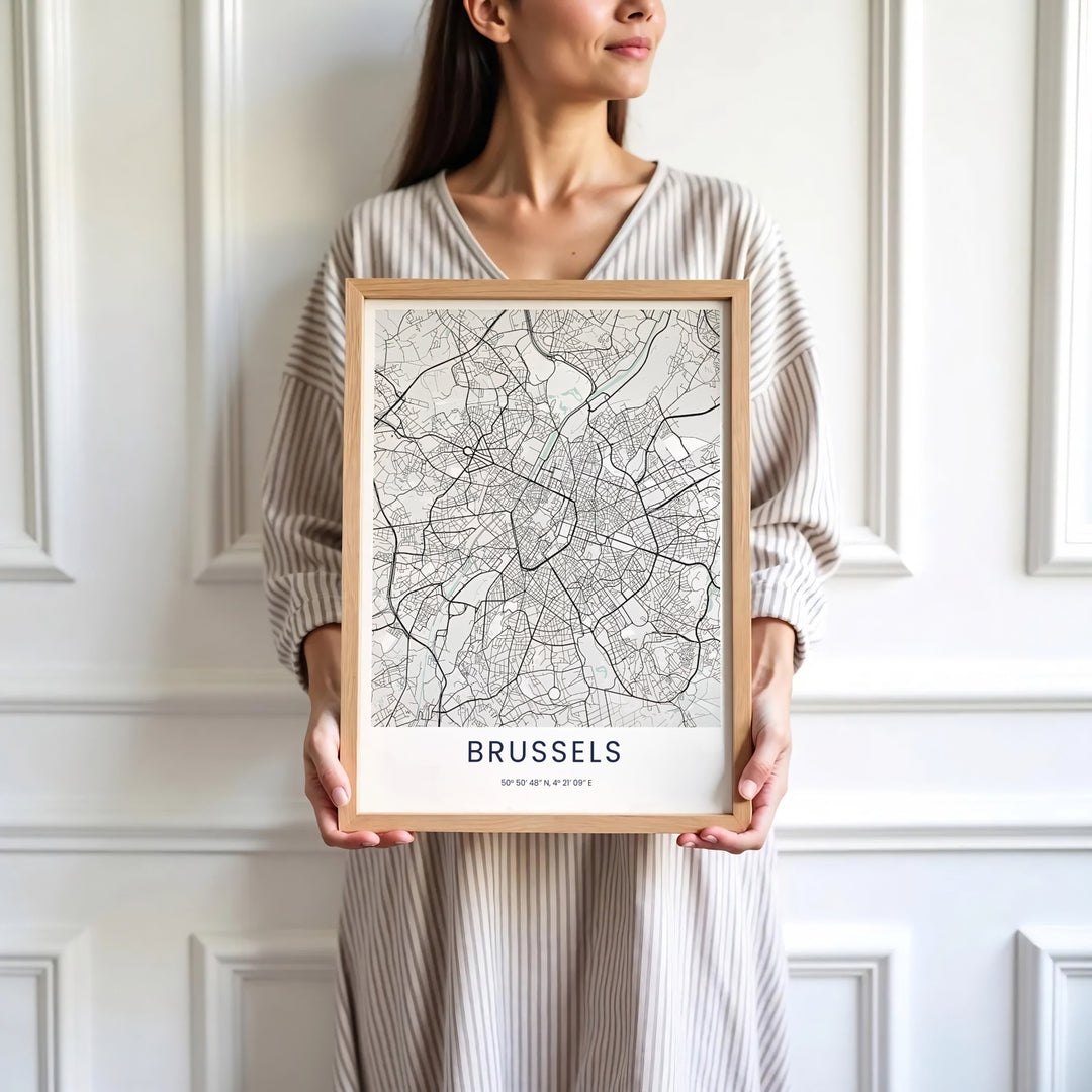 Sophisticated European map decor illustrating the street plan and monochrome aesthetic of Brussels in Belgium. Available in multiple presentation styles such as unframed paper prints, custom framed posters, and gallery stretched canvas.