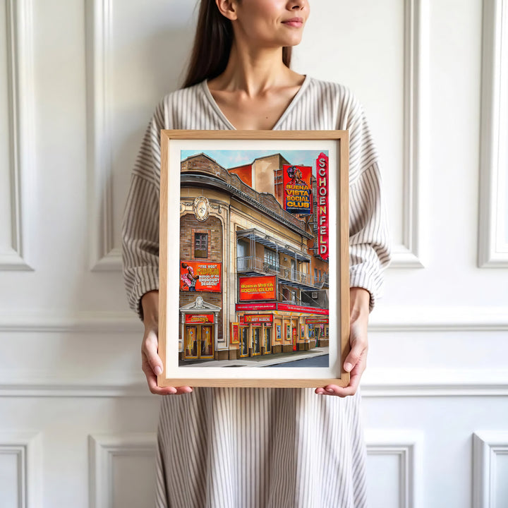 Contemporary urban illustration of the Gerald Schoenfeld Theatre facade on West 45th Street hosting Buena Vista Social Club on Broadway, presented by MapYourDreams where customers can choose from unframed paper posters, ready-to-hang canvas decor, or custom framed wall art choices.
