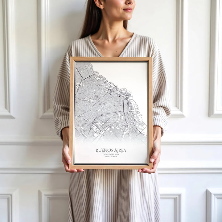 Sleek linear city grid print showing the roadways, blocks, and coastal borders of Buenos Aires in sharp jet-black ink. Skillfully produced by MapYourDreams, this artwork is provided in multiple formats including unframed paper stock, custom frames, or stretched canvas wraps.