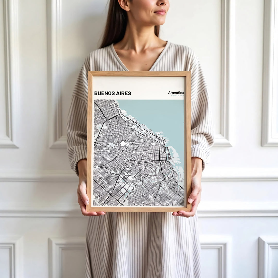 Sleek city grid print showing the roadways, urban blocks, and ice-blue coastal borders of Buenos Aires on fine archival paper. Skillfully produced by MapYourDreams, this artwork is provided in multiple formats including unframed paper stock, custom frames, or stretched canvas wraps.