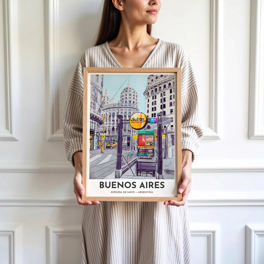 Architectural streetscape print depicting the Subte metro portal and ornate building facades in vibrant ink and watercolor. Skillfully produced by MapYourDreams, this artwork is provided in multiple formats including unframed paper stock, custom frames, or stretched canvas wraps.