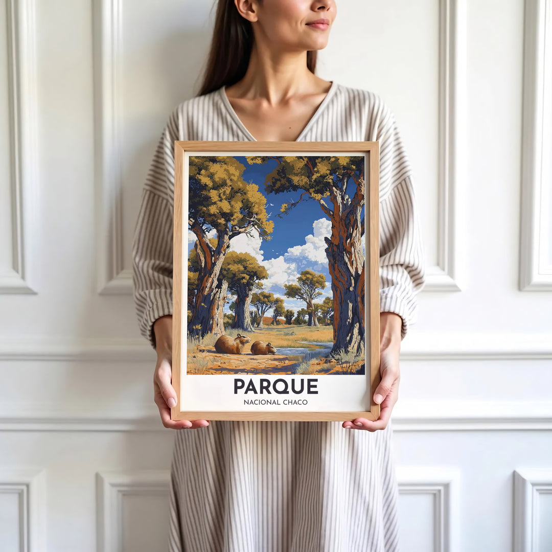 Fine art savanna poster showing capybaras under golden trees in Chaco National Park with rich blue hues. Skillfully produced by MapYourDreams, this artwork is provided in multiple formats including unframed paper stock, custom frames, or stretched canvas wraps.