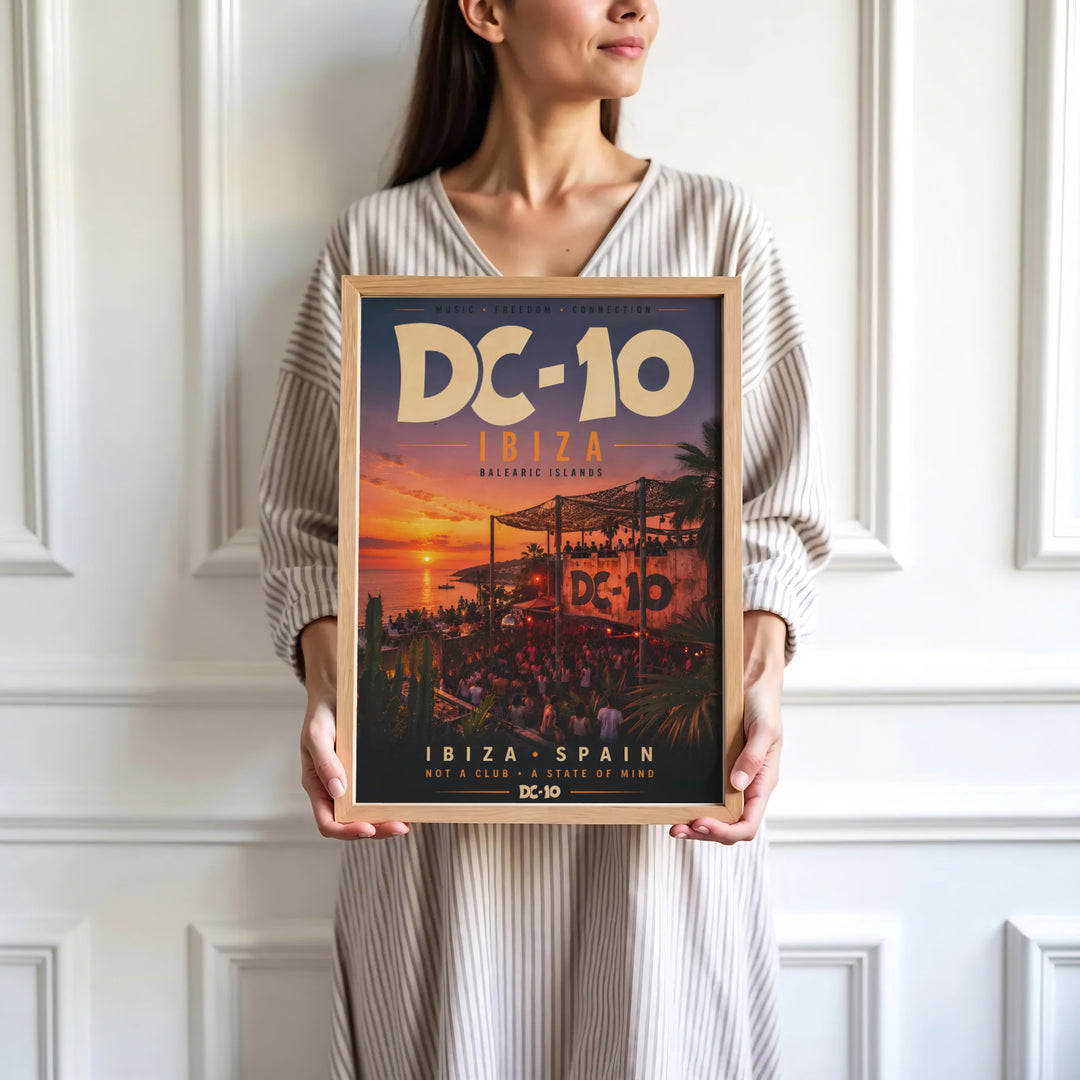 Mediterranean coastal event poster displaying warm twilight sky and venue logo at DC-10 in Ibiza, Spain, available at MapYourDreams as an unframed print, stretched canvas, or custom framing options to complement warm bohemian home decor layouts.