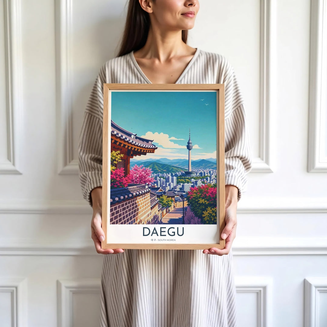 Minimalist white-bordered travel print of Daegu, South Korea, showcasing a scenic vista of 83 Tower and traditional Hanok courtyard walls under a sunlit sky. Offered by MapYourDreams, this artwork is available in flexible options including unframed paper, custom wooden frames, and gallery canvas wraps.