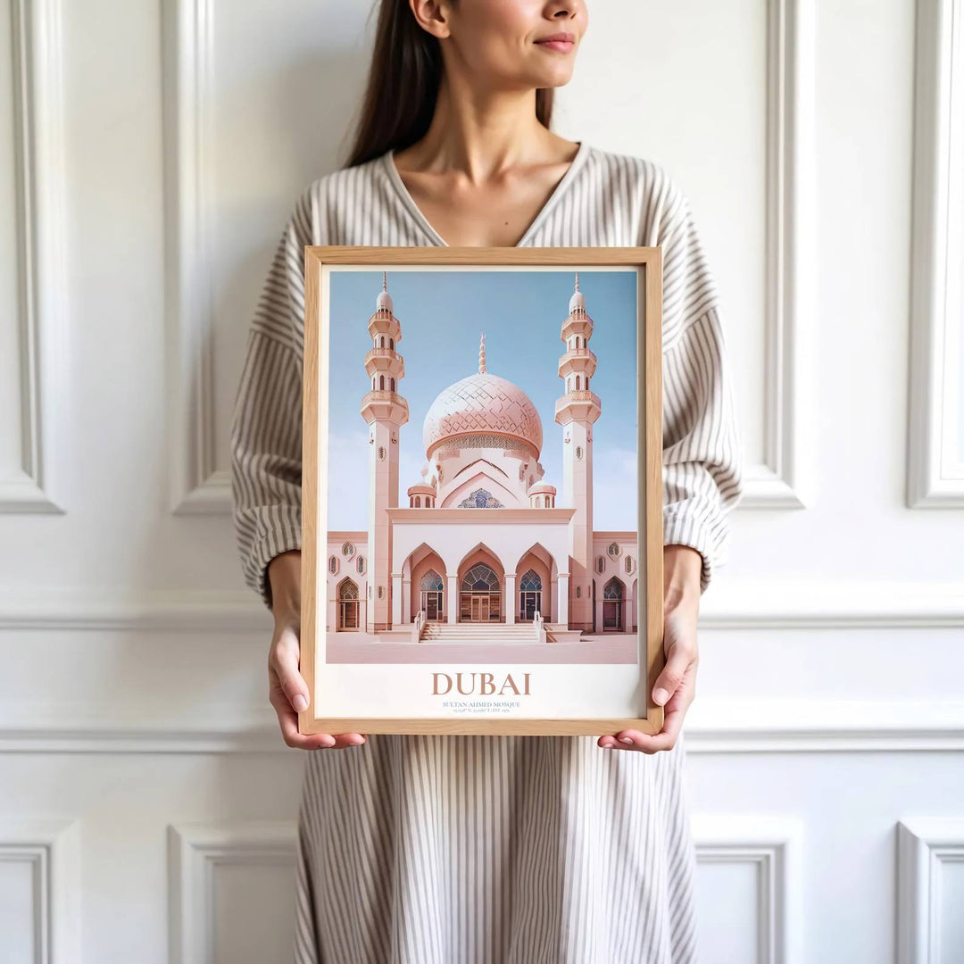 Travel poster of Dubai UAE featuring Jumeirah Mosque with blushing sandstone walls and soaring minaret silhouettes. Prepared by MapYourDreams, this artwork is available in flexible options including unframed paper, custom wooden frames, and gallery canvas wraps for chic home decor.