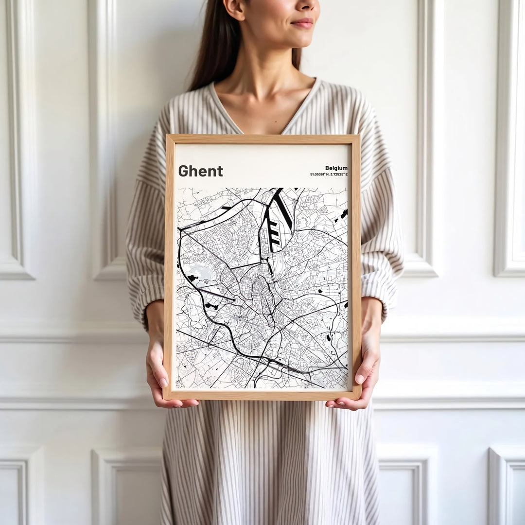 Sophisticated Scandinavian cartography wall decor displaying coordinates and roads for Ghent, Belgium. Available in multiple presentation styles such as unframed paper prints, custom framed posters, and gallery stretched canvas.